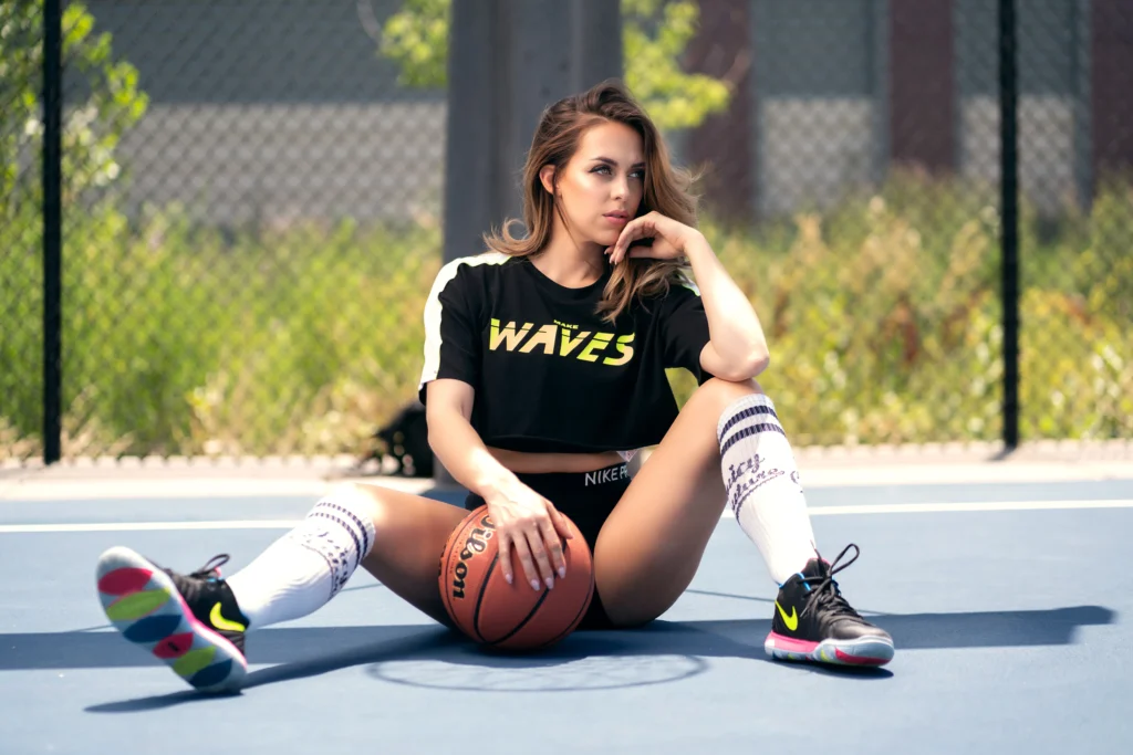 Outdoor basketball modeling portrait on court capturing athlete fashion and urban sports photography in Denver Colorado