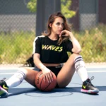 Outdoor basketball modeling portrait on court capturing athlete fashion and urban sports photography in Denver Colorado