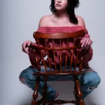 studio-portrait-chair-dramatic-lighting-denver